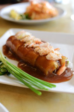 Vietnamese pork and crab spring roll with sauce