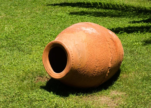 stock image Clay vase on the grass