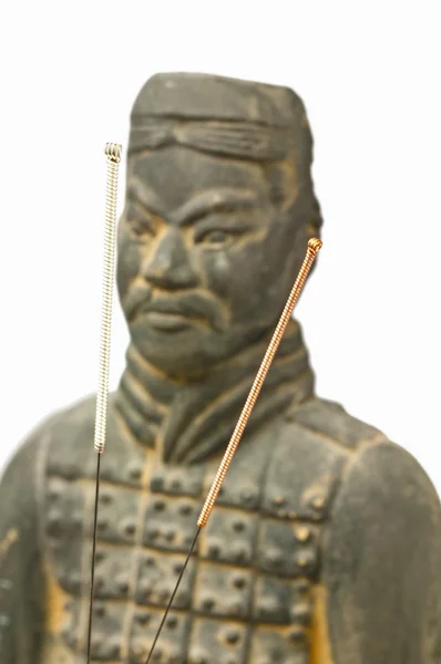 Acupuncture needles with chinese antique soldier — Stock Photo, Image