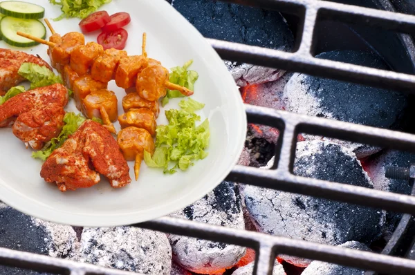 Barbecue with marinated meat — Stock Photo, Image