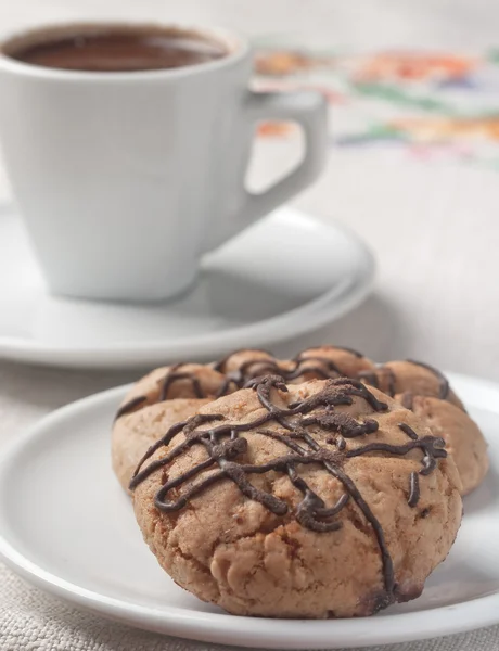 Café com biscoito de chocolate — Fotografia de Stock