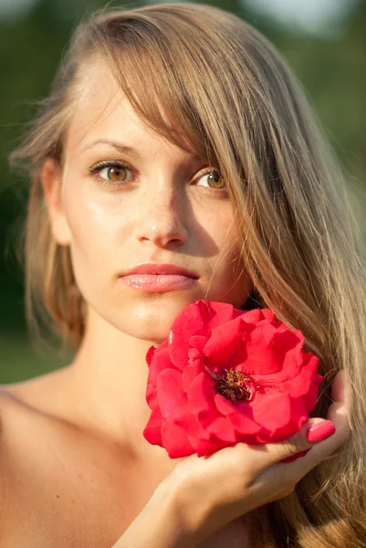 Young sexy girl with red flower #2 — Stock Photo, Image