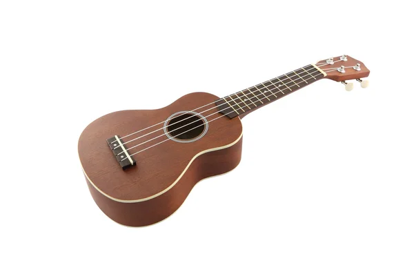 Guitarra pequena (ukulele) do corpo sobre fundo branco . — Fotografia de Stock