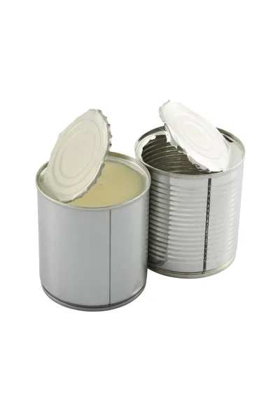 Full opened in front of empty sweet milk tin can on white background. Stock Image