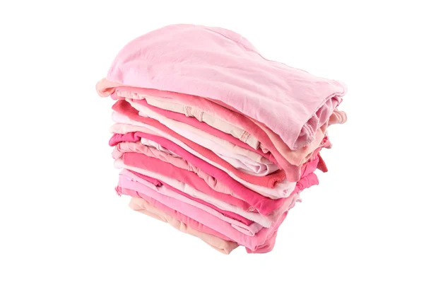Куча розовых оттенков ткани на белом фоне . — стоковое фото