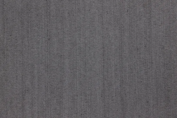Calça jeans preta com textura de fio branco . — Fotografia de Stock