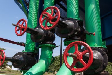 Red handle gate valve with steel pipe on gas compressor station