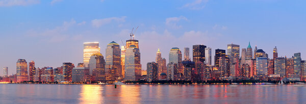 New York City Manhattan downtown skyline at sunset over Hudson River panorama