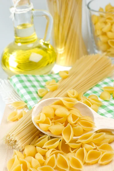 Pasta with wooden spoon — Stock Photo, Image