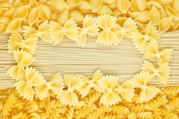Pasta and farfalle background — Stock Photo, Image