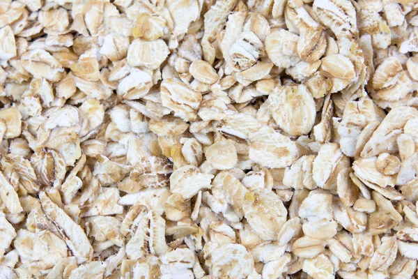 The background of oat flakes — Stock Photo, Image