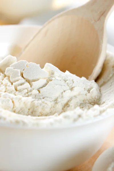 Flour a wooden spoon closeup — Stock Image Flour a wooden spoon closeup Stock Image