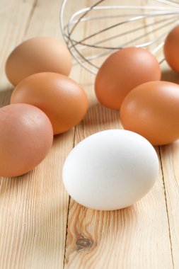 Basic ingredients for dough. Milk, eggs and flour. clipart