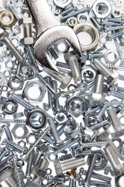 Wrench on nuts and bolts clipart