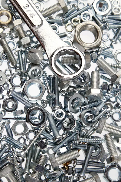 Wrench on nuts and bolts — Stock Photo, Image