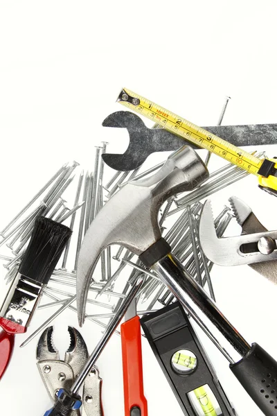 Assorted work tools on plain background — Stock Photo, Image