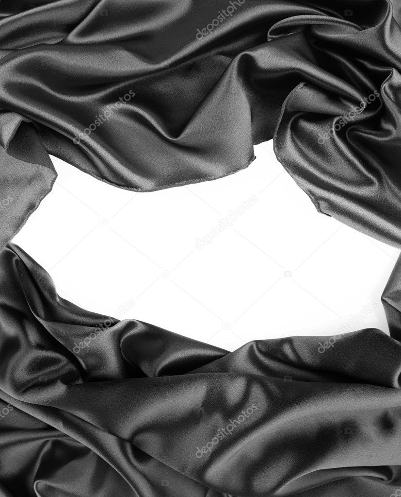Closeup of gap in silk fabric on white