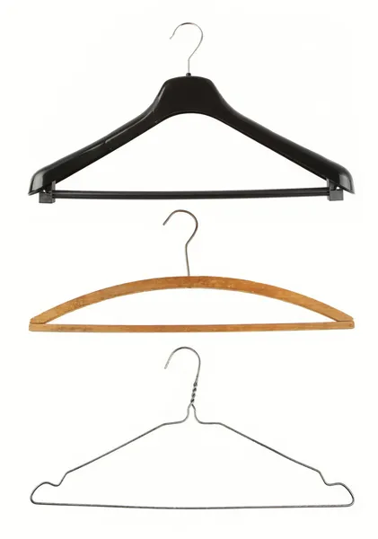 Coat hangers on plain background — Stock Photo, Image