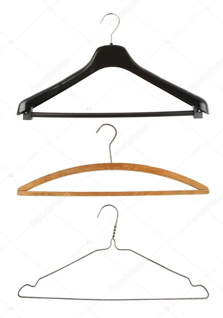 Coat hangers on plain background