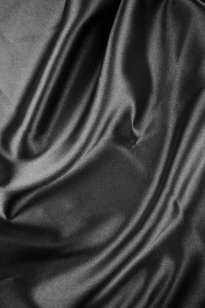 Vértes redők fekete selyem szövet — Stock Fotó