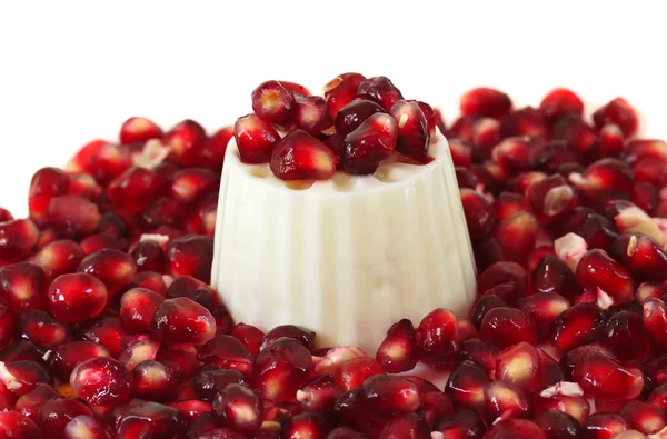 Pomegranate seeds with a white fresh cheese