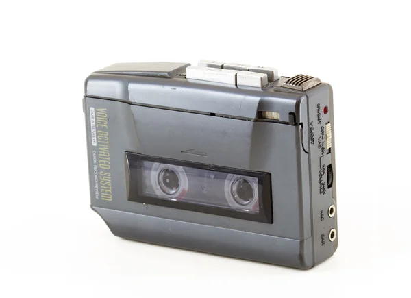 Caminante vintage con cinta de audio en un fondo blanco Imagen de archivo