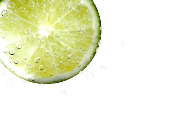 Slice of lime — Stock Photo, Image
