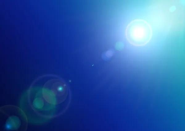 Ήλιος και φακού φωτοβολίδα στο γαλάζιο του ουρανού — Διανυσματικό Αρχείο
