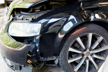 Car with body damage after an accident clipart
