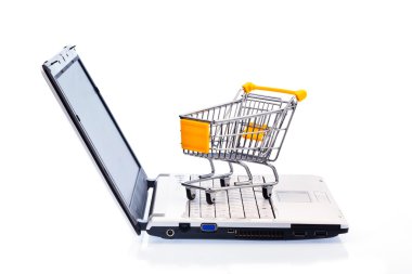 Cart and keyboard. online shopping clipart