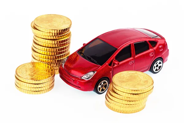 Modellauto und Münzen. Autokosten — Stockfoto