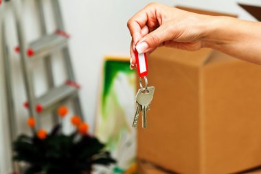Key when moving a house. clipart