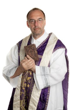 Catholic priest with bible in church clipart