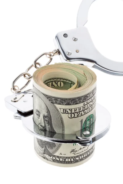 Dollar currency notes with handcuffs — Stock Photo, Image