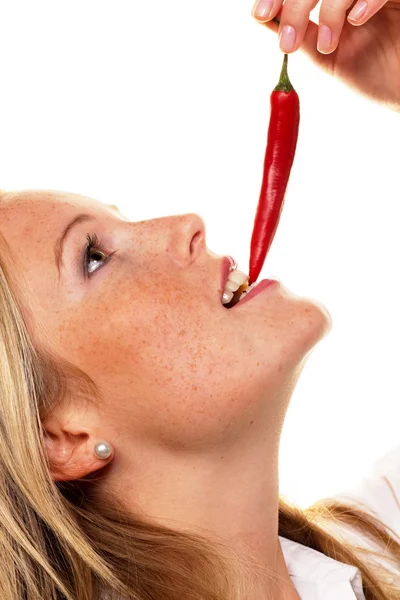 Young woman with chilli — Stock Photo, Image