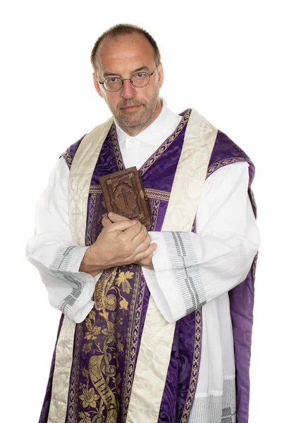 stock image Catholic priest with bible in church