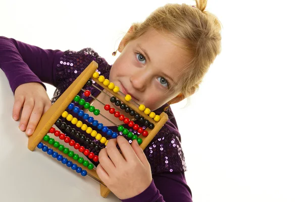 School child is expecting an abacus Stock Photo