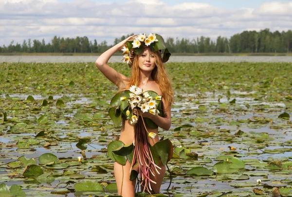 stock image A girl on the lake