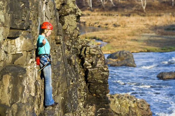 Stock image The girl on the rock