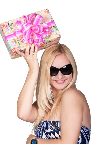 Happy young girl holding a present — Stock Photo, Image