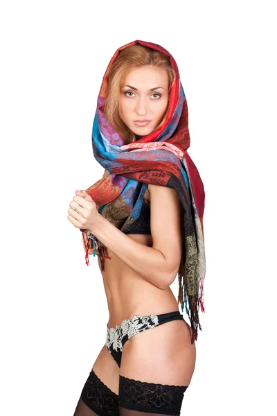 Elegant young woman in a colorful scarf — Stock Photo, Image