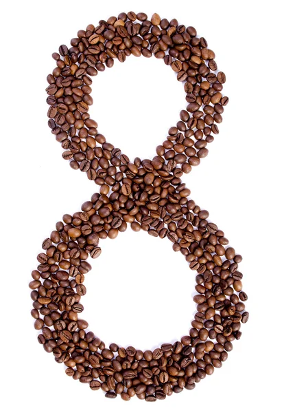 Number 8 from coffee beans. Royalty Free Stock Photos