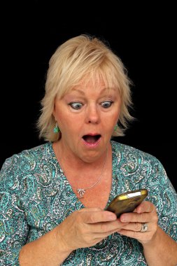 Mature Blonde Woman with Cell Phone (3) clipart