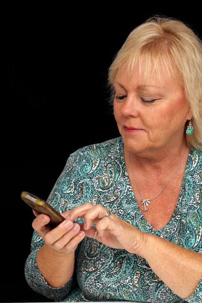 Oudere Blonde vrouw met mobiele telefoon (2) — Stockfoto