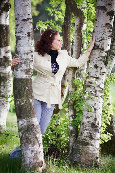 The woman among birches. — Stock Photo, Image