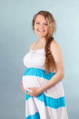 Portrait of beautiful pregnant woman clipart