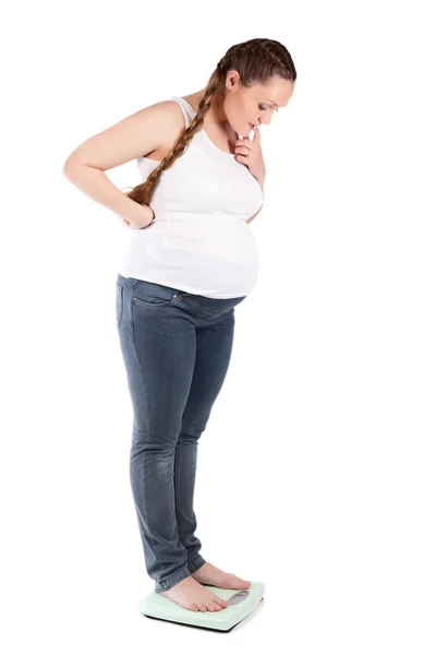 Hamile kadın, ölçekler, yalıtım — Stok fotoğraf