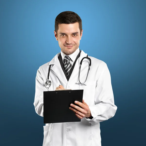 Homem médico com estetoscópio — Fotografia de Stock