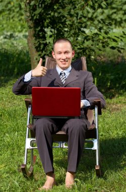 Businessman Working Outdoors clipart