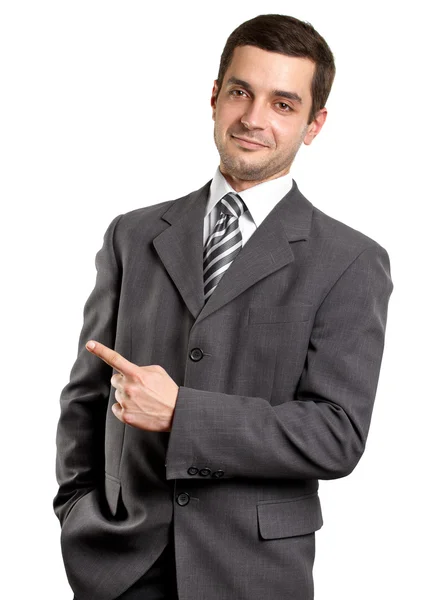 Obchodní muž ukazuje něco s prstem — Stock fotografie